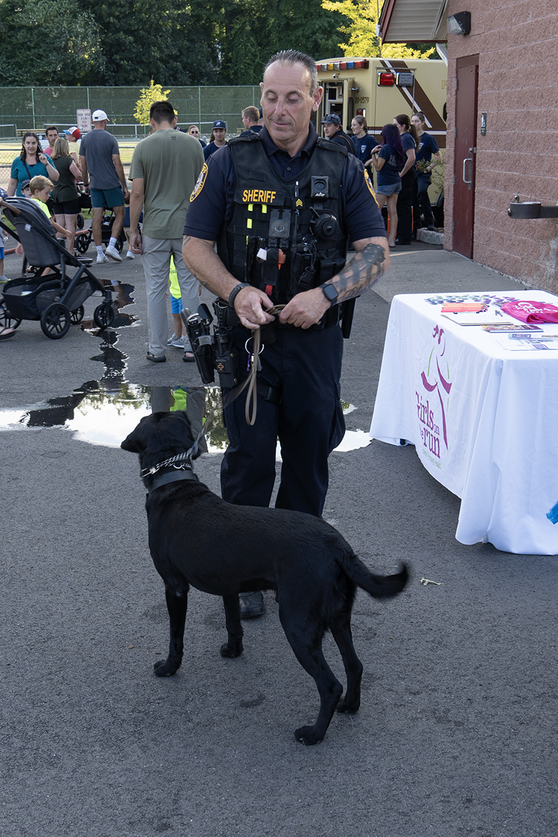 Bomb sniffing dog with handler Sgt. Anthony Gialanella